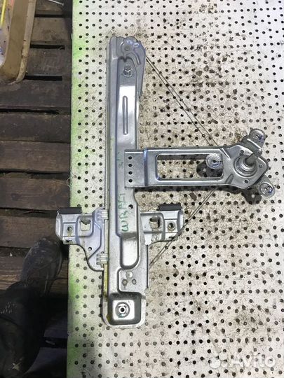 Стеклоподъемник задний левый (механический) Chevro