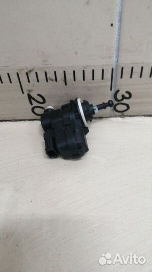 Моторчик корректора фары Nissan Almera