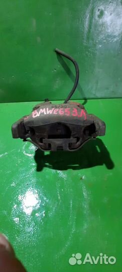 Суппорт тормозной BMW 7-Series слева сзади 3421675