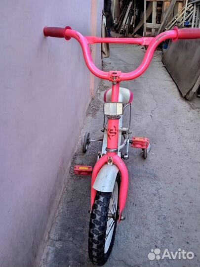 Велосипед детский 4-7 лет розовый четырехколесный