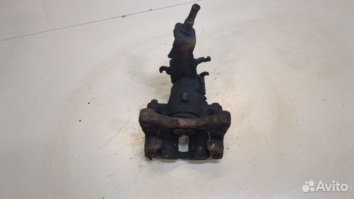 Суппорт правый задний Nissan Almera Tino