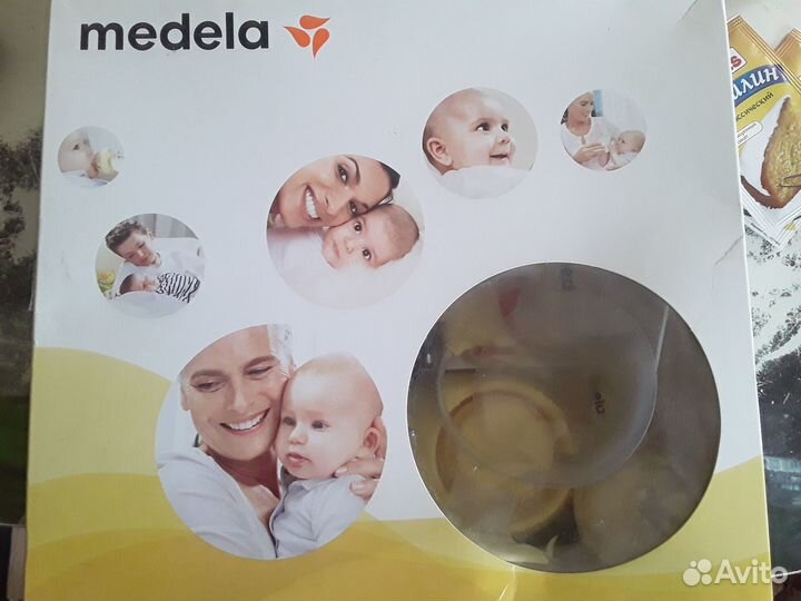 Молокоотсос medela электрический