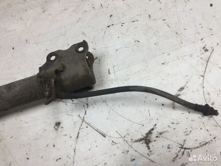 Амортизатор задний левый Nissan Bluebird U13 с1991