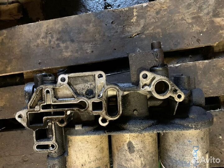 Кронштейн масляного фильтра Renault Premium DXI 11