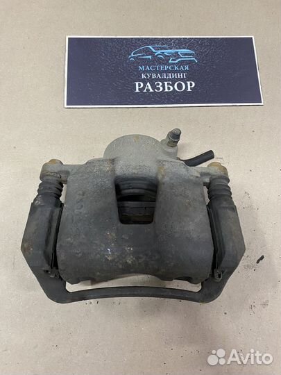 Тормозной суппорт передний левый Chevrolet lacetti