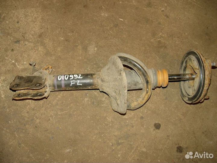 Передний амортизатор Mitsubishi outlander 06г