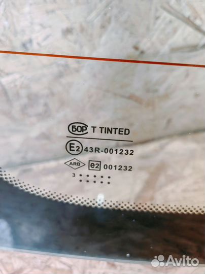 Стекло заднее Renault Logan