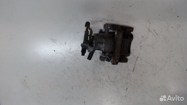 Суппорт правый задний Skoda Octavia (A7)