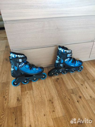 Роликовые коньки