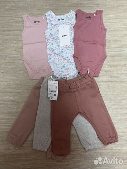 Пакет новой одежды для малышки