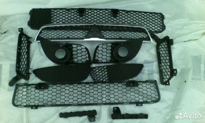 Lancer 10 бампер,противотуманки,юбки,капот