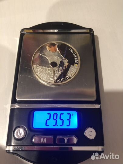 Цветная монета с В.В. Путиным