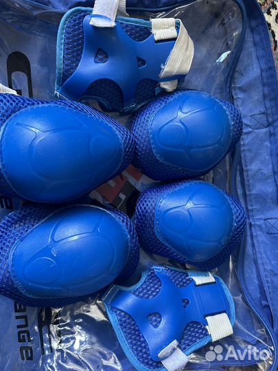 Роликовые коньки