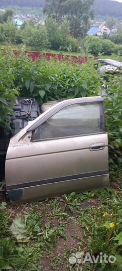 Дверь Nissan sunny FB15