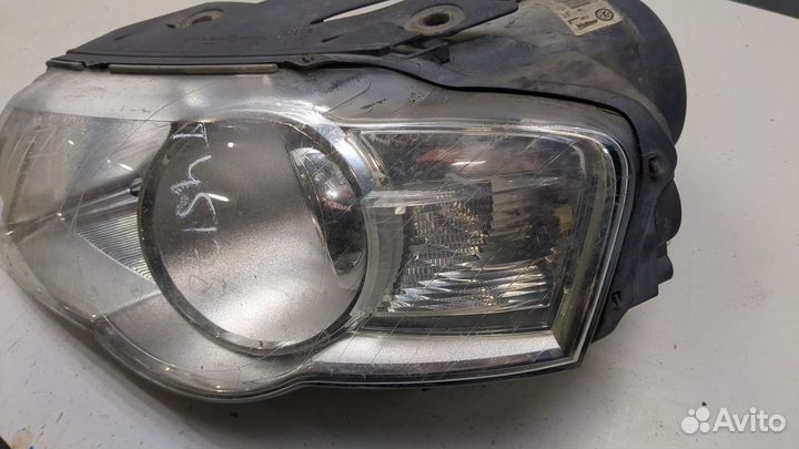 Фара (передняя) левая Volkswagen Passat 6