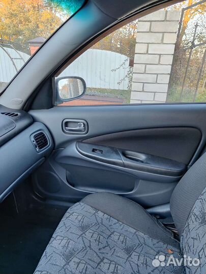 Салон nissan almera н16