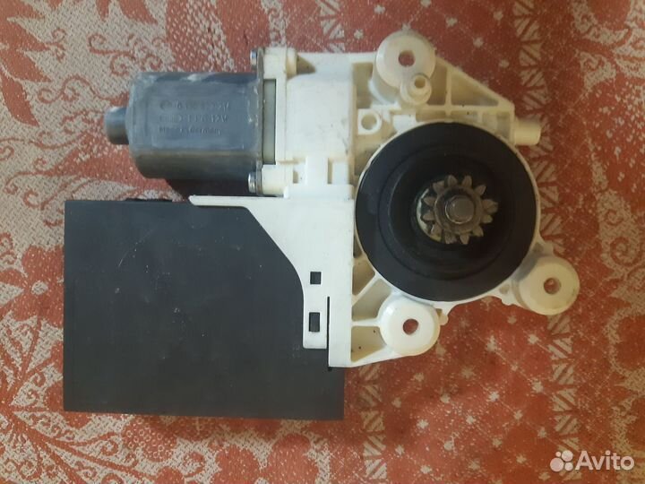 Моторчик стеклоподъемника Ford Focus 2