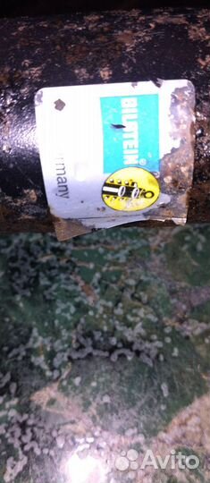 Стойка амортизатора задняя левая Ауди 100 с3