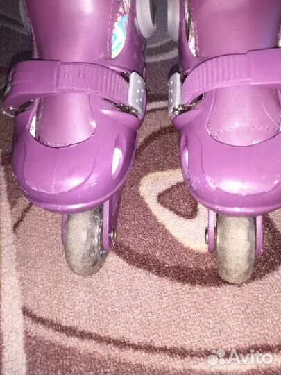 Роликовые коньки