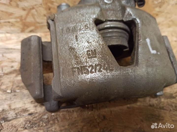 Суппорт передний левый Opel Astra F