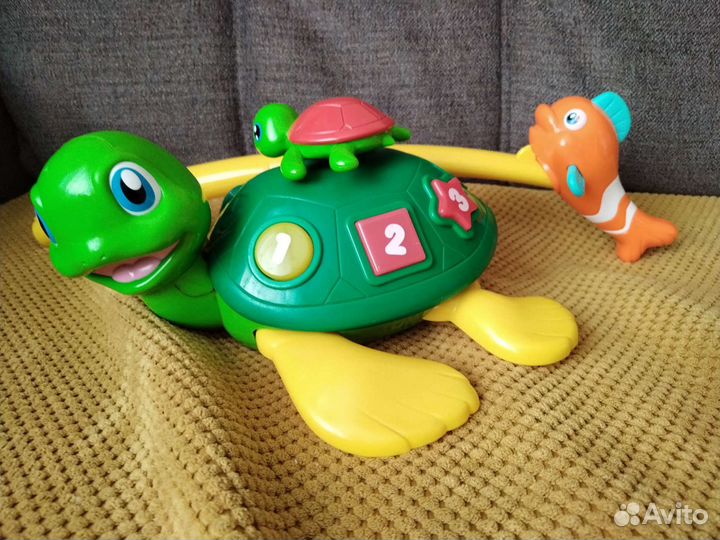 Игрушка каталка с ручкой