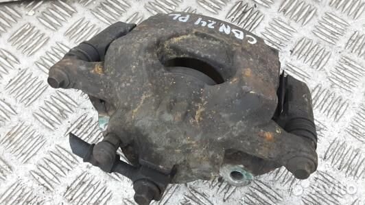 Суппорт тормозной передний левый opel astra J (CBN