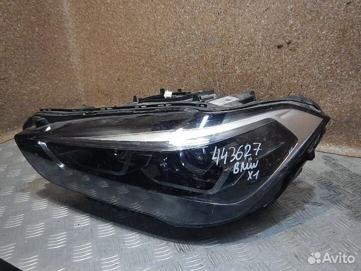 Фара левая BMW X1