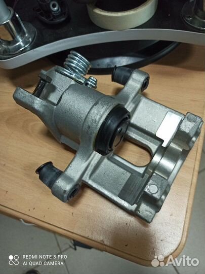 Суппорт тормозной задний левый nissan Almera4500