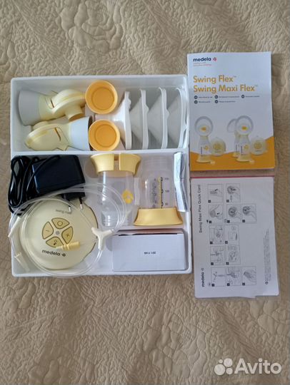 Молокоотсос medela электрический