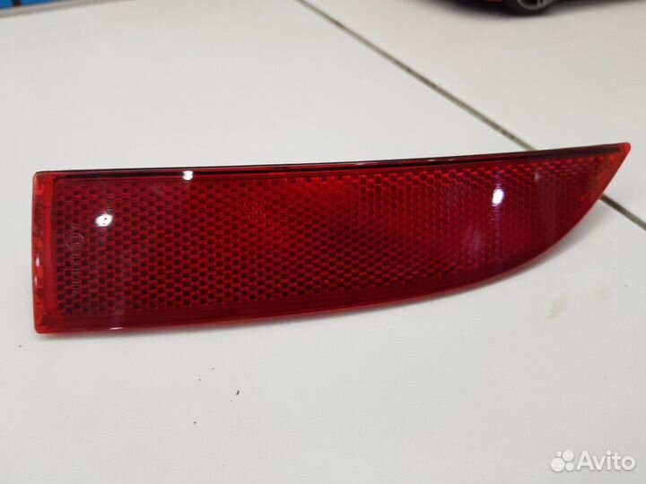 Катафот заднего бампера левый (Renault Logan)