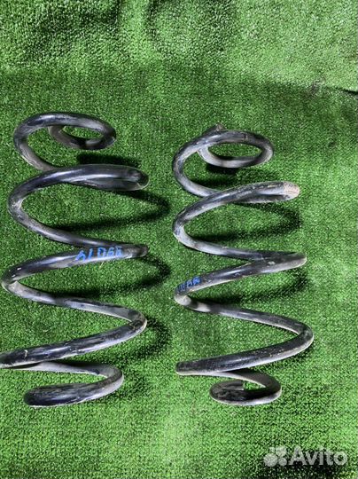 Пружина Nissan note e11 задняя