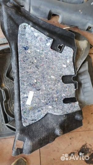 Обшивка багажника левая Renault Sandero 2 Stepway