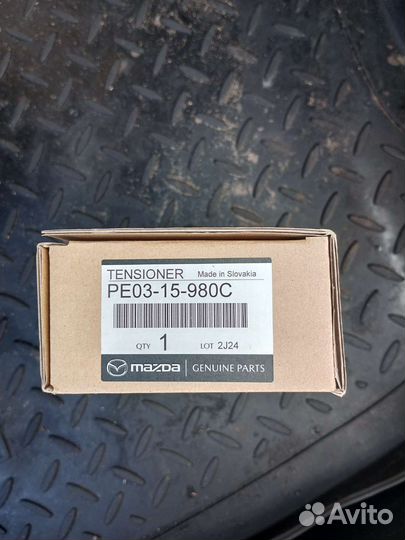 Натяжитель приводного ремня Mazda PE0315980C