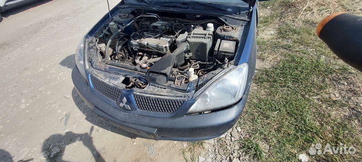 Передняя панель Mitsubishi Lancer 9