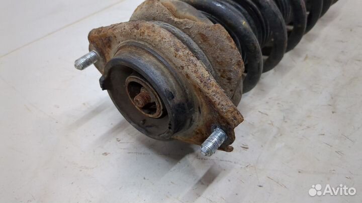 Амортизатор подвески левый задний Subaru XV