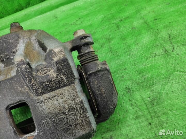 Суппорт передний правый Tucson / Sportage 04-10