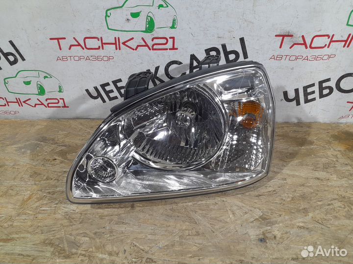 Фара левая Kia Carens (2002-2006)