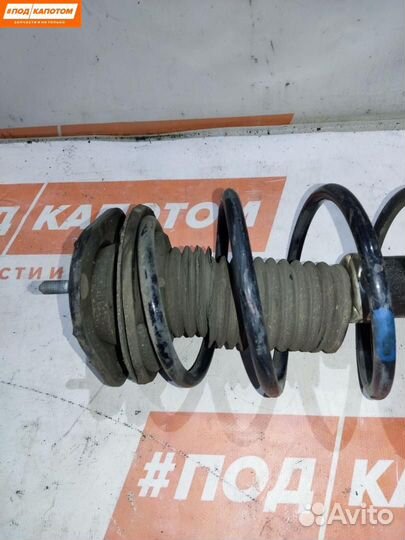 Стойка амортизатора передняя левая Toyota Corolla