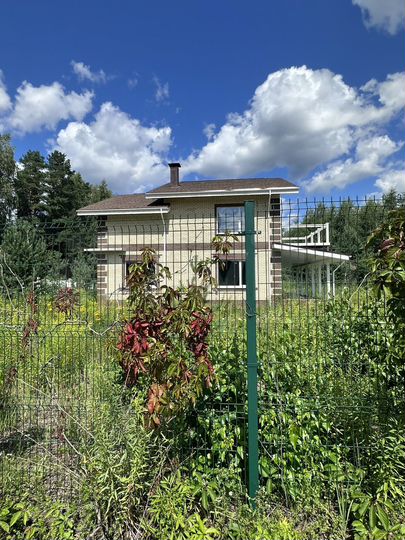 Коттедж 327 м² на участке 18 сот.