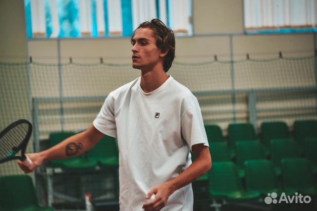 Тренер по большому теннису