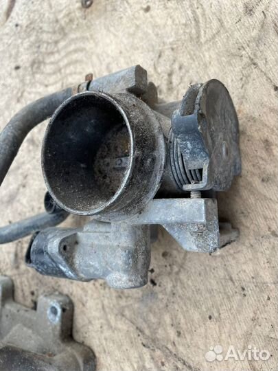 Опель тигра дроссельная заслонка