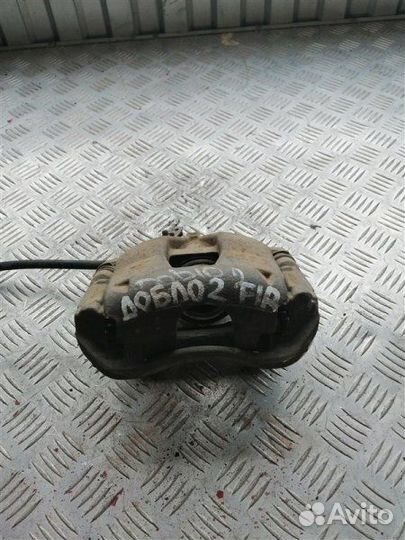 Суппорт тормозной передний правый Fiat Doblo 223