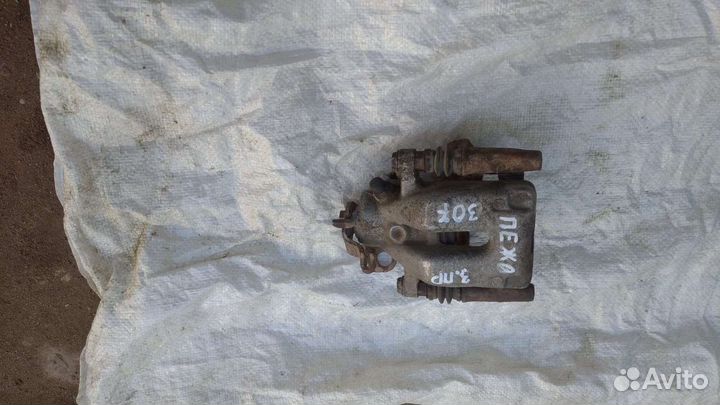 Суппорт тормозной задний. Peugeot 307