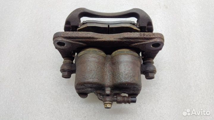 Суппорт тормозной передний левый Mazda Cx-7 ER