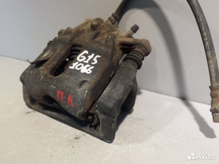 Суппорт передний левый Nissan Almera G15 седан