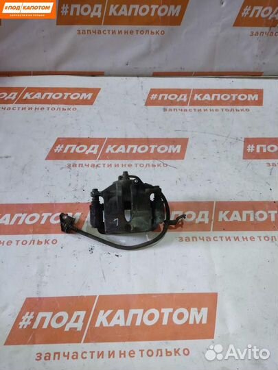 Суппорт тормозной передний левый Hyundai ix35 2012