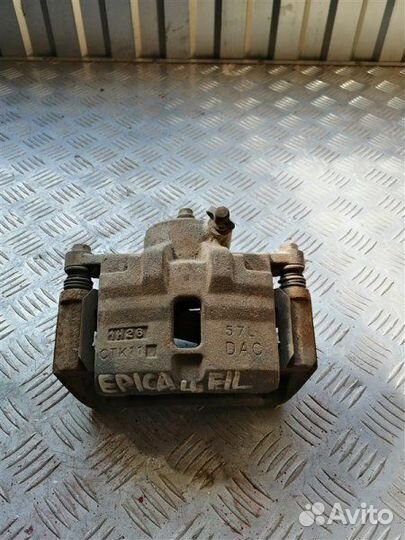 Суппорт тормозной передний левый Chevrolet Epica