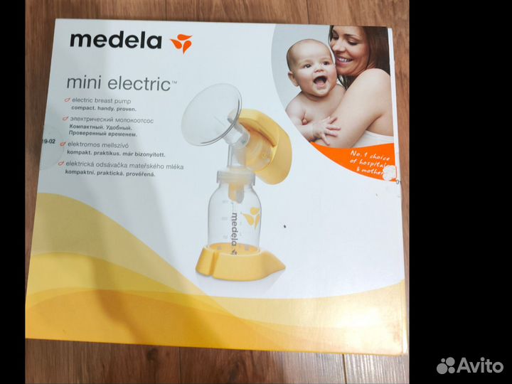 Молокоотсос medela электрический