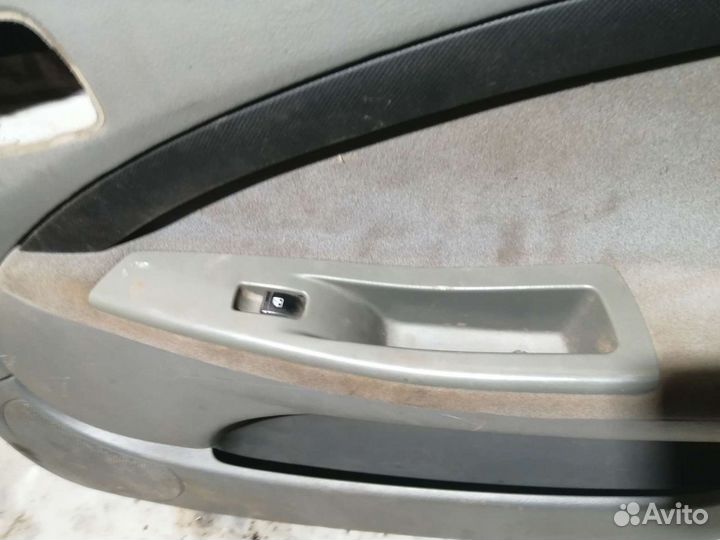 Обшивка двери Chevrolet Lacetti J200