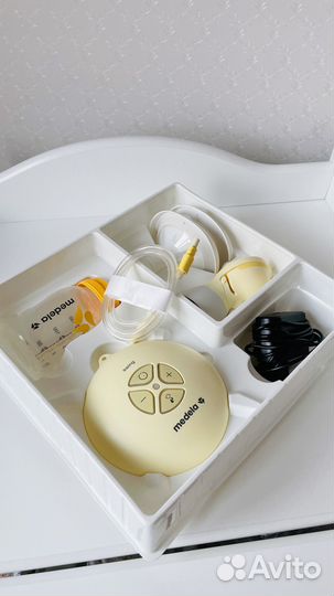Молокоотсос medela swing flex электрический
